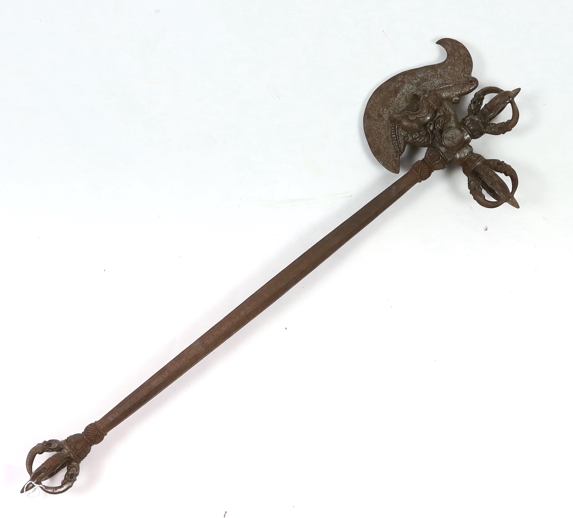 An ornate Buddhist iron axe, 91cm long